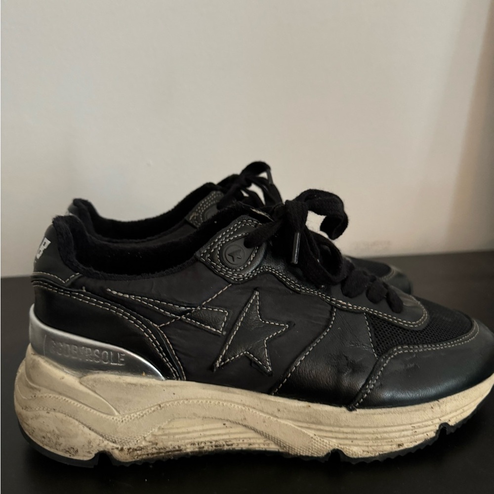 Golden Goose Dad star